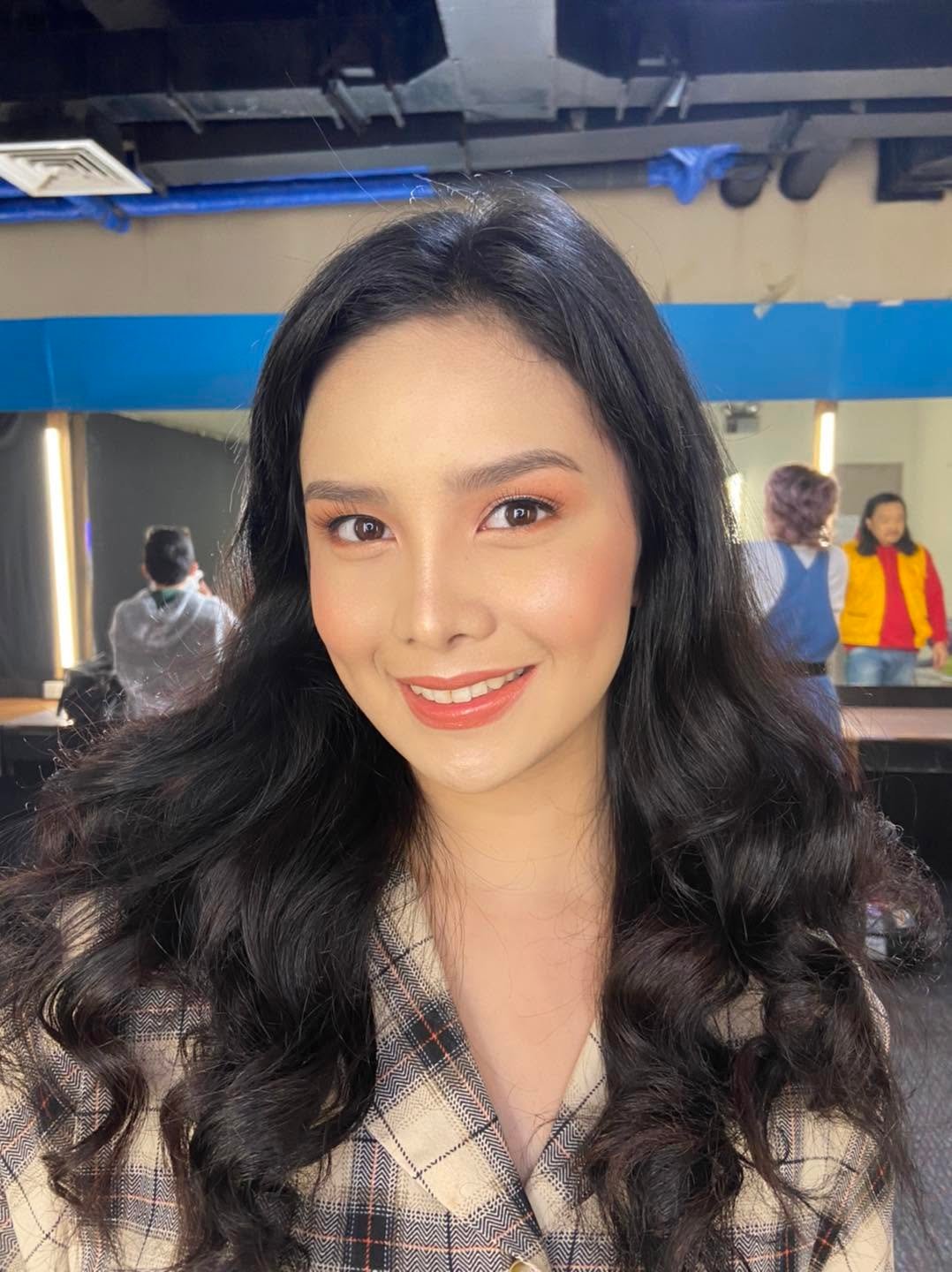 Natural glowing makeup look for a television appearance