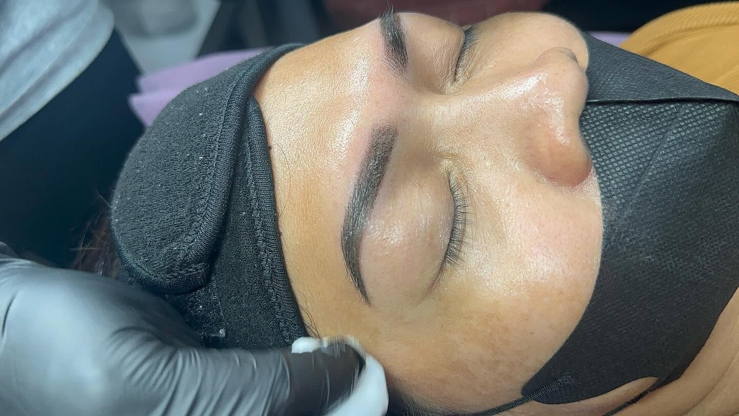 Close-up of an ombre brow tattoo result
